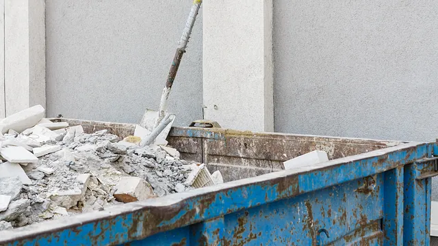 Large Skip filled with rubble